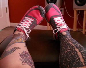 new pink nikes with leg tattoos